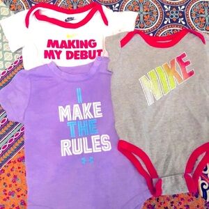 THREE onesies (Nike/Under Armour) 6-9m